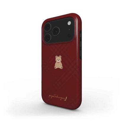 Dark red bear phone case with small teddy graphic on back; raised camera cutout