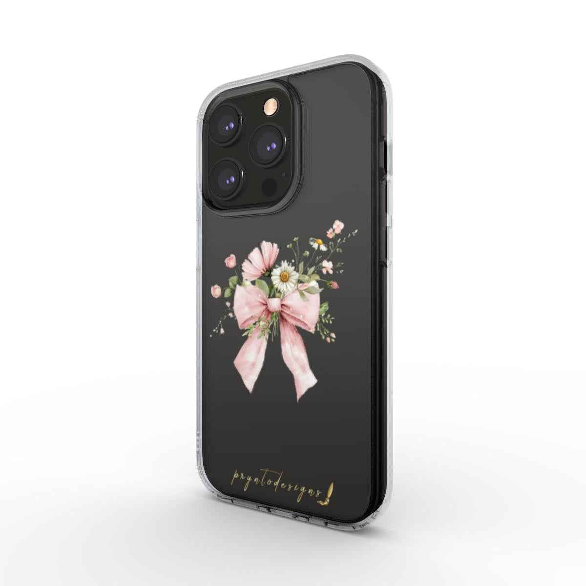 Clear phone case with pink floral bow and ribbon detail on dark backing
